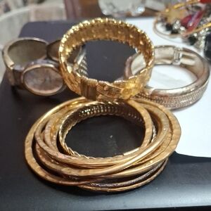 Elegant Gold-Tone Bangle Set. The watch Needs Battery